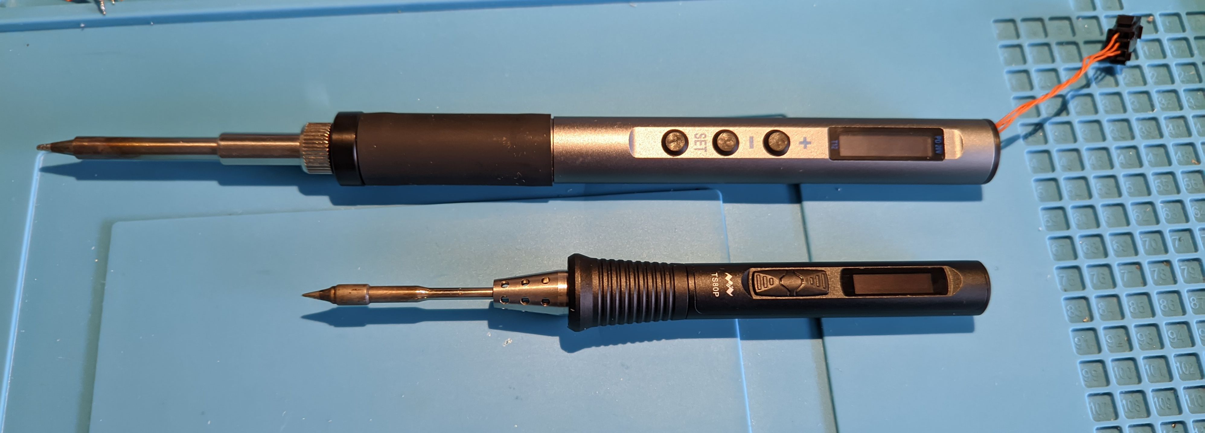 Two soldering irons side by side